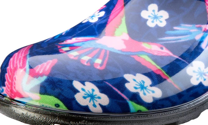 Colorful floral-patterned clog shoe on a white background